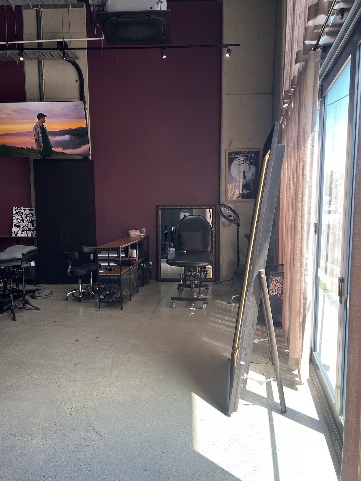 Afternoon light across the tattoo floor